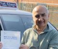 Sharam with Driving test pass certificate